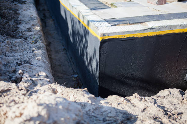 Professional Waterproofing technician working in Mount Rainier, MD